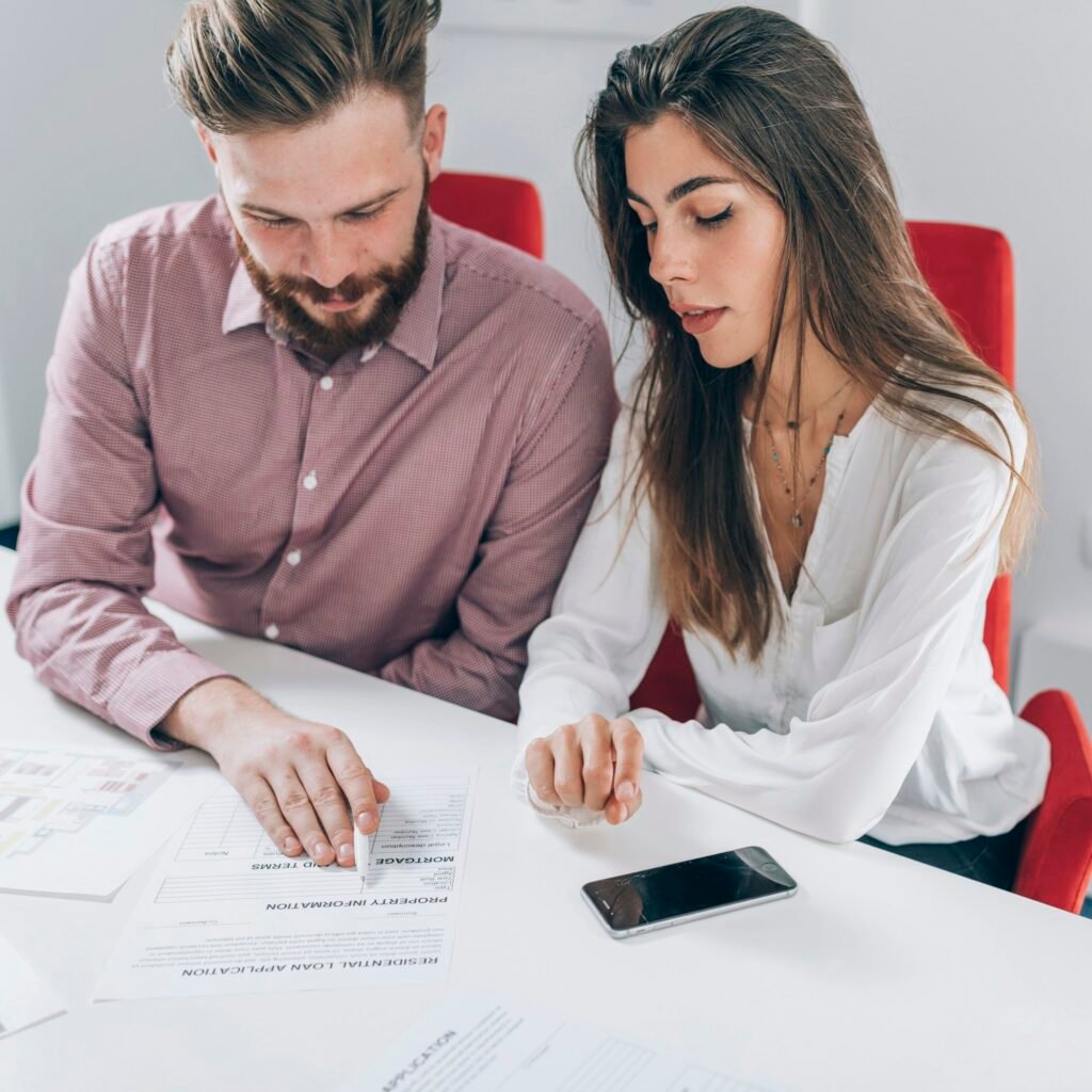 Couple Signing Mortgage Contract